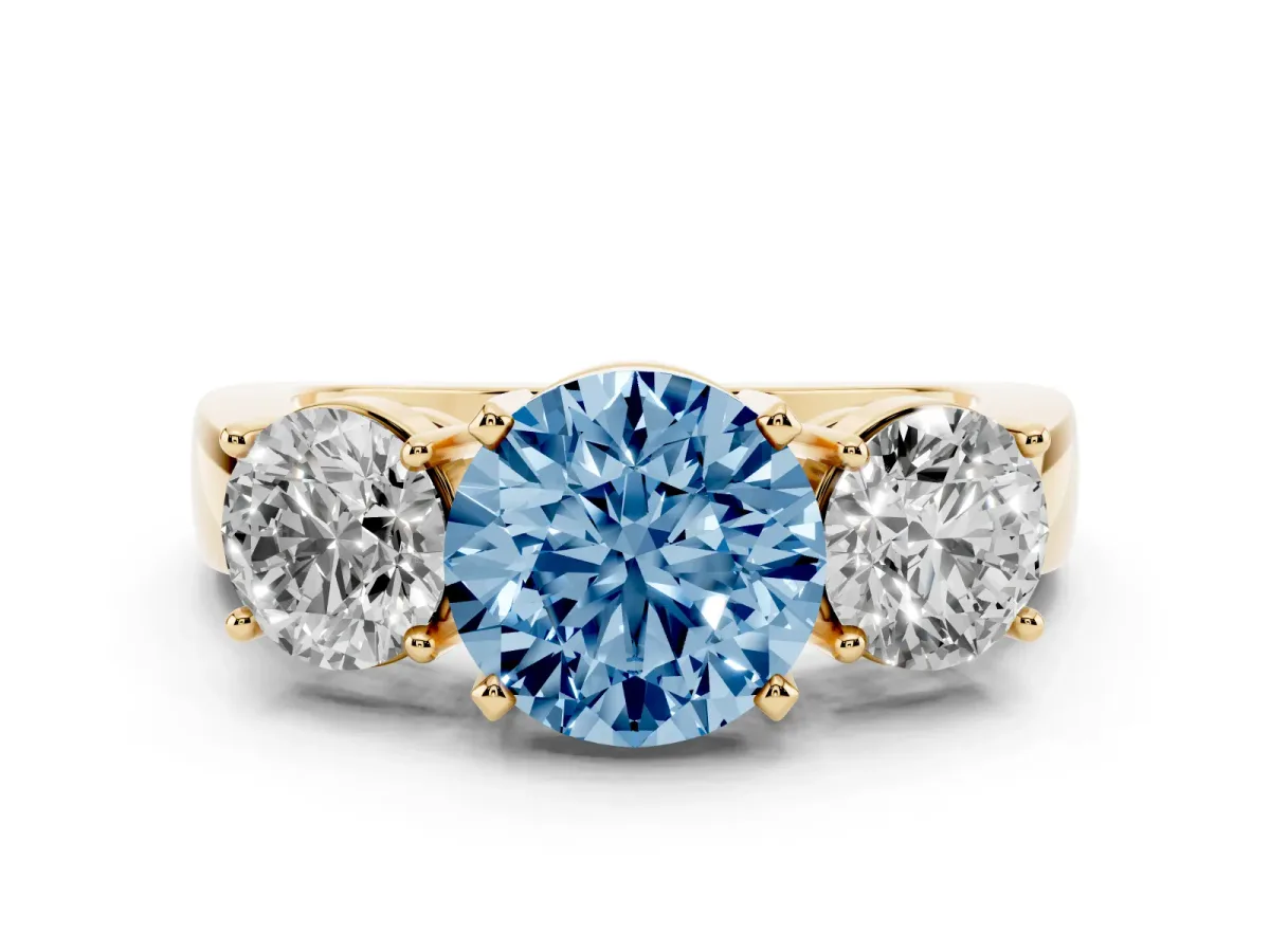 Fancy Blue Three-Stone Round Cut Diamond Ring with Round Side Stones, Classic Band, and Four-Prong Setting Yellow gold