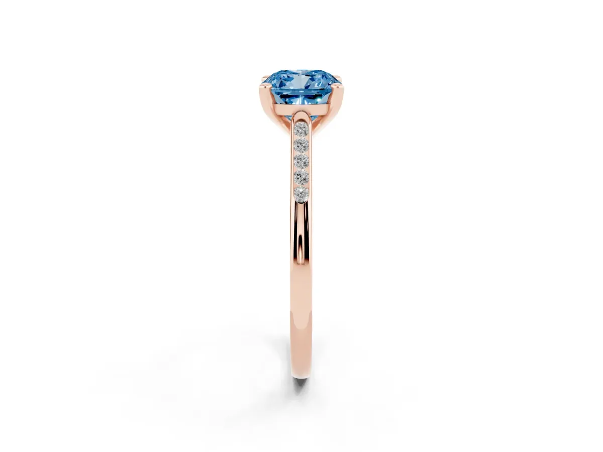 Fancy Blue Cushion Cut Diamond Solitaire Ring with Channel Set Round Band and Prong Setting Rose gold