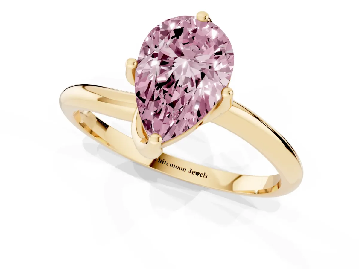 Fancy Pink Pear Cut Diamond Solitaire Engagement Ring with Four-Prong Setting and Classic Band Yellow gold