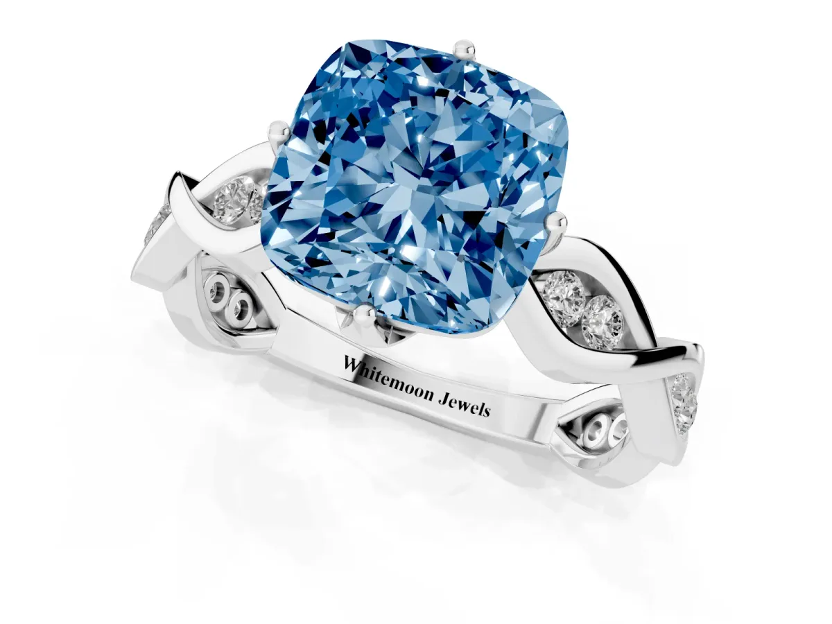 Fancy Blue Cushion Cut Solitaire Twist Band with Leaf Prong Setting Silver