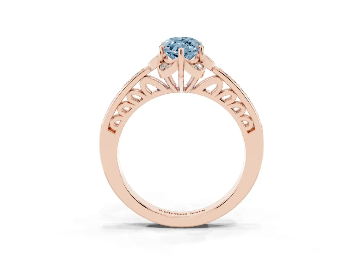 Fancy Blue Marquise Cut Cut Halo Diamond Ring with Channel Set Band and Four-Prong Setting Rose gold