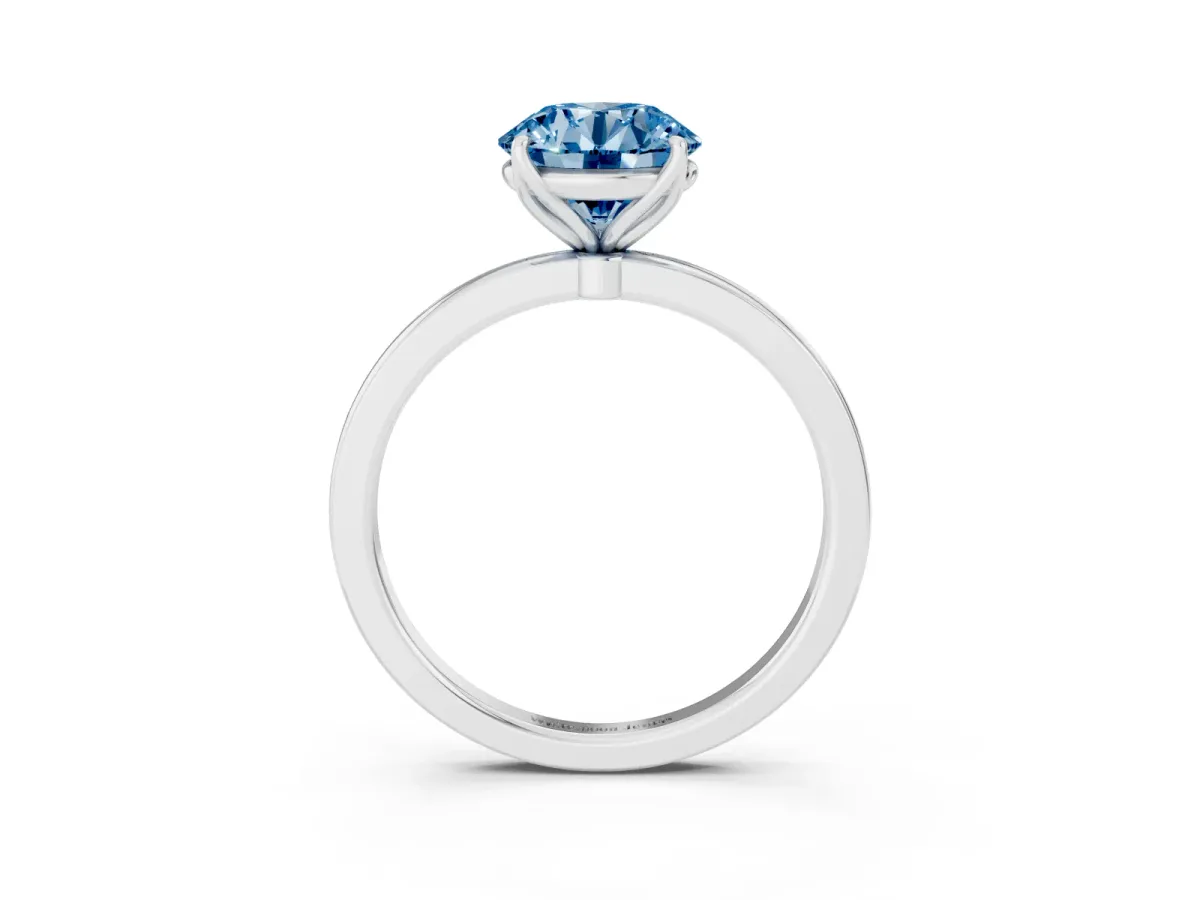 Fancy Blue Round Cut Diamond Solitaire Ring with Thin Band and Prong Setting Silver