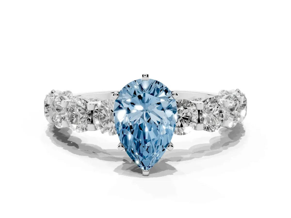 Fancy Blue Pear Cut Diamond Side Stone Engagement Ring with Four-Prong Setting White gold