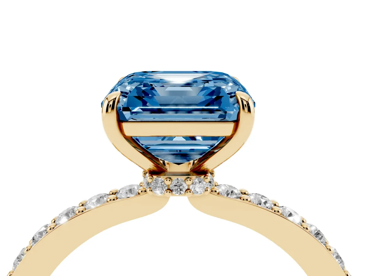 Fancy Blue Asscher Cut Diamond Solitaire Engagement Ring with Pavé Band and Four-Prong Setting Yellow gold