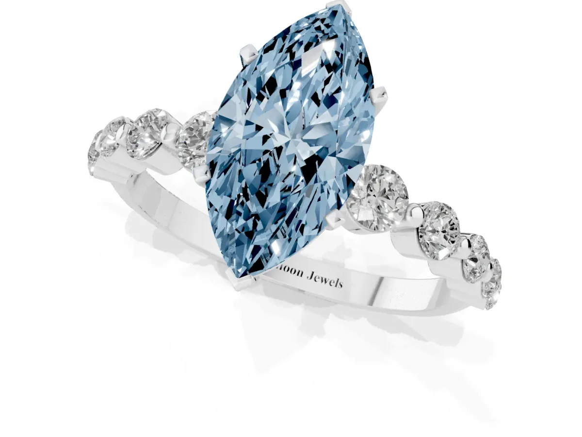 Fancy Blue Marquise Cut Solitaire Diamond Ring with Pave Band and Four-Prong Setting Silver