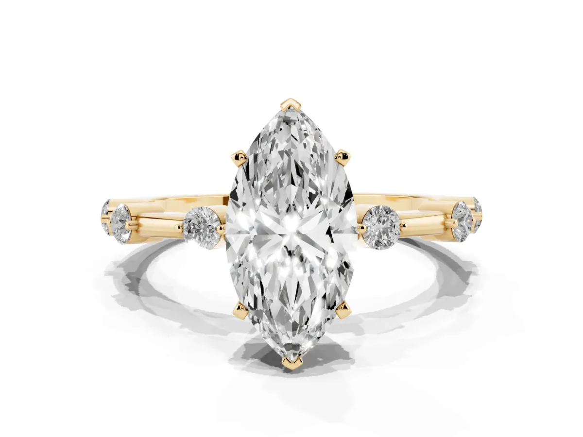 Marquise Cut Solitaire Diamond Ring with Bezel Set Side Stones and Prong Setting Yellow gold