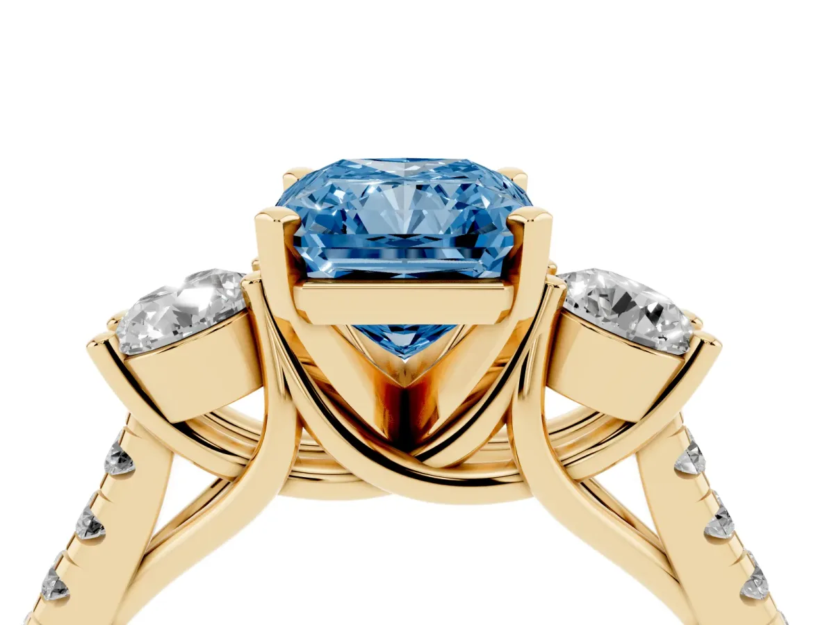 Fancy Blue Three-Stone Radiant Cut Diamond Pavé Band with Four-Prong Setting Yellow gold