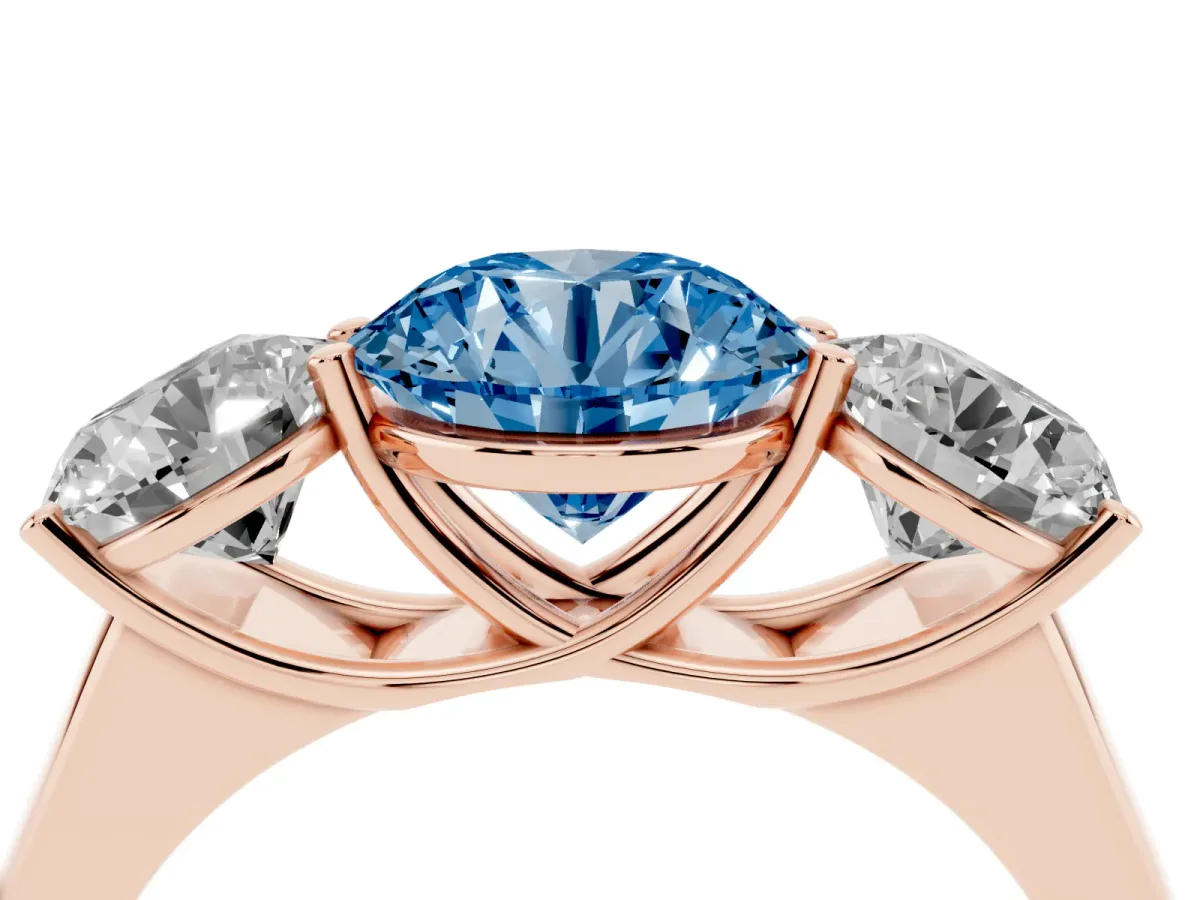 Fancy Blue Round Cut Three-Stone Diamond Ring with Prong Setting on a Classic Band Rose gold