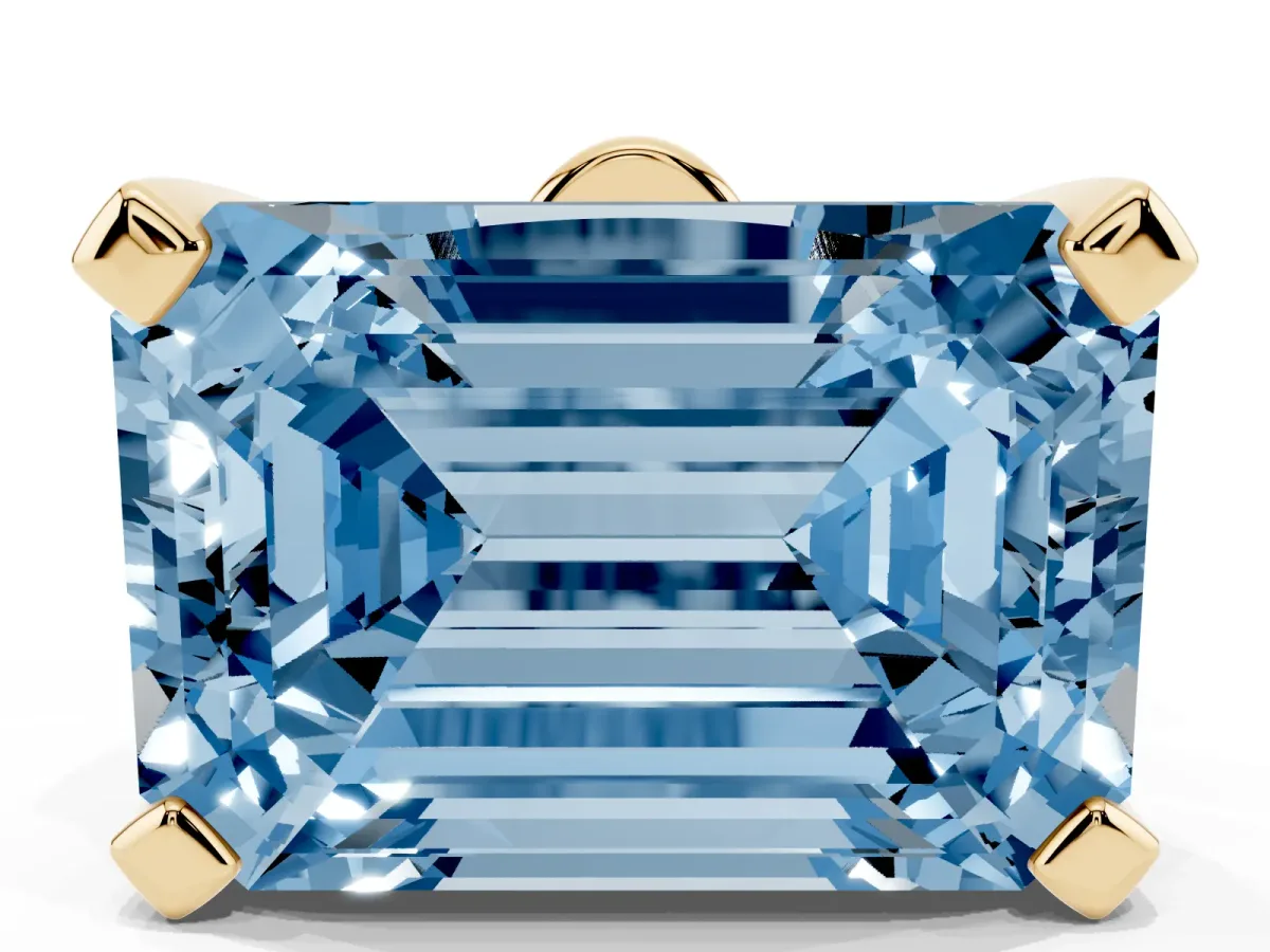 Fancy Blue Emerald Cut Diamond Solitaire Ring with Prong Setting and Classic Band Yellow gold