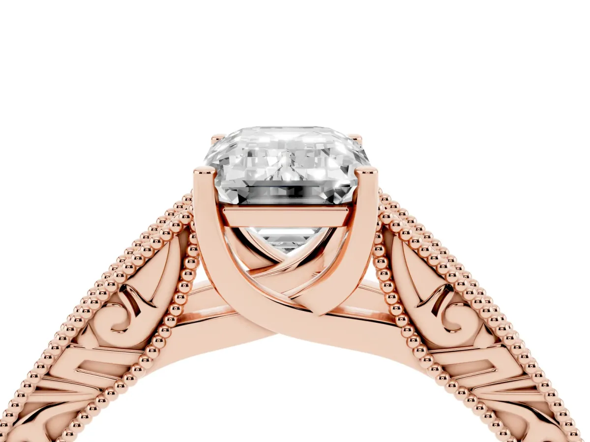 Emerald Cut Diamond Solitaire Ring with Engraved Band and Four-Prong Setting Rose gold