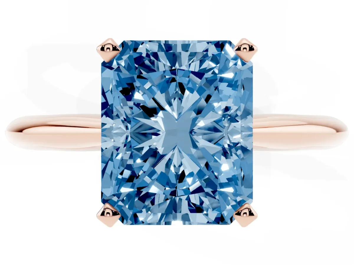 Fancy Blue Radiant Cut Cut Solitaire Ring with Four-Prong Setting on a Classic Band Rose gold