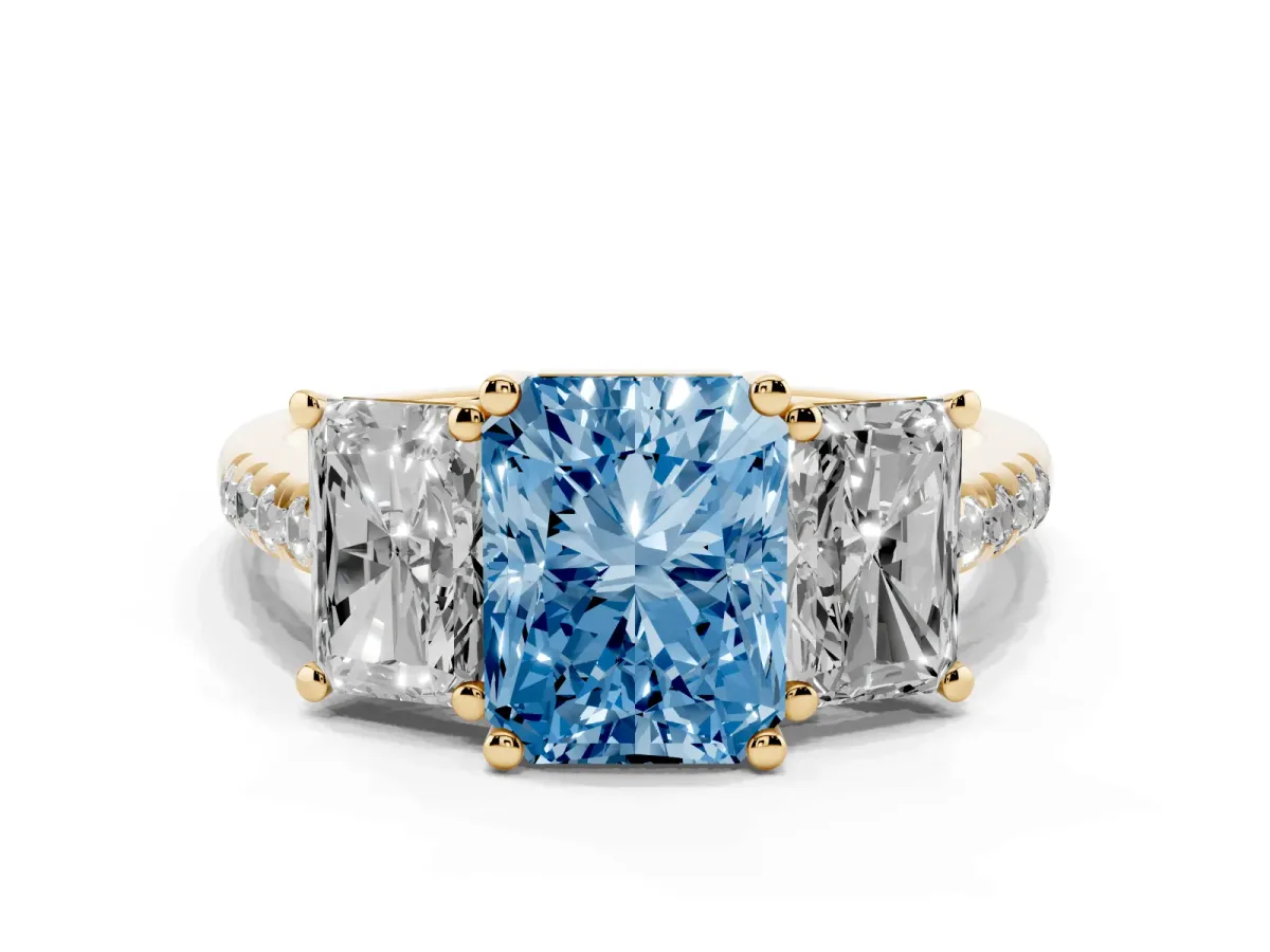 Fancy Blue Three-Stone Radiant Cut Diamond Ring with Round Pavé Band and Prong Setting Yellow gold