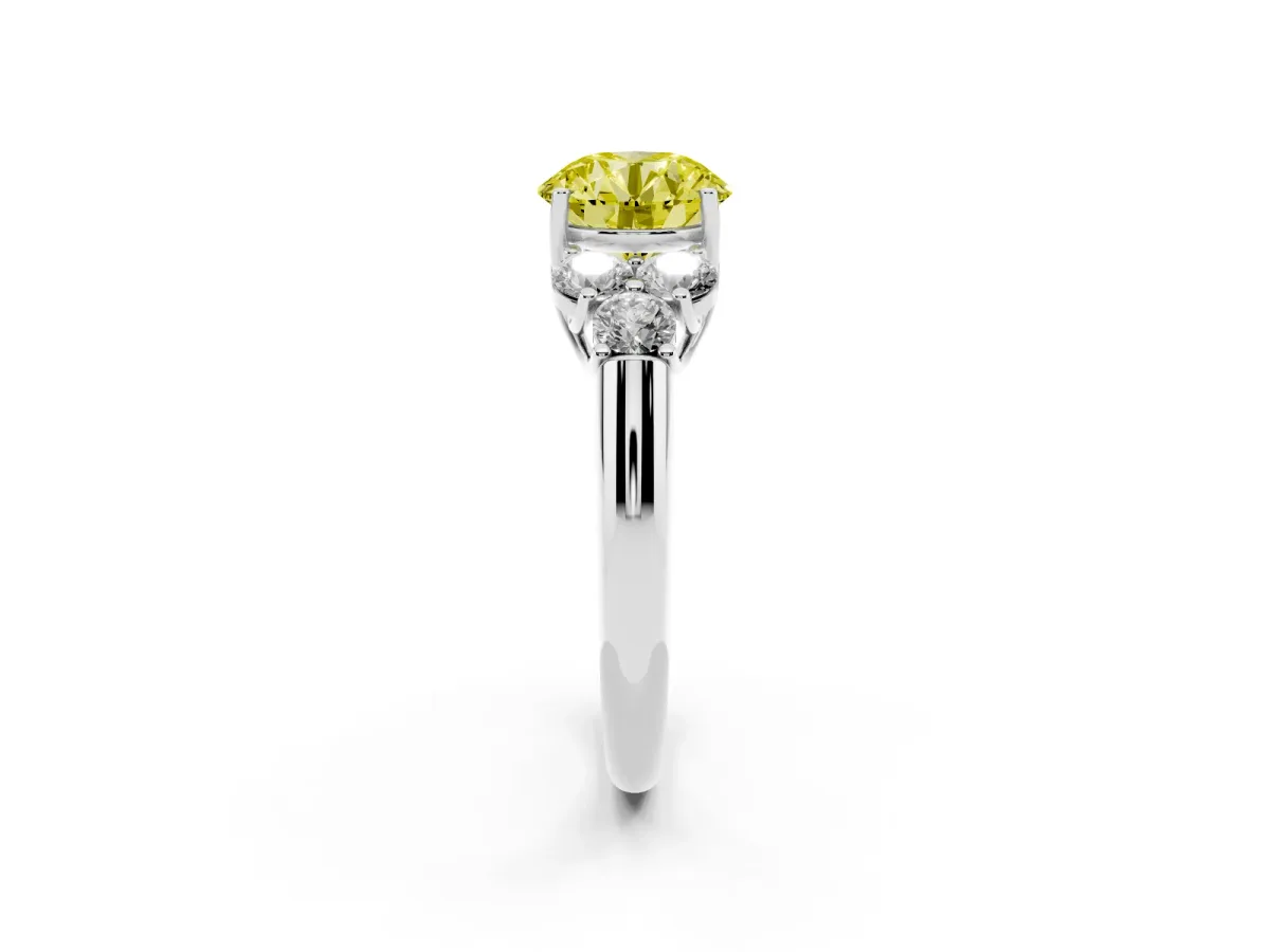 Fancy Yellow Round Cut Cut Diamond Cluster Ring with Round Accent Stones and Prong Setting on a Classic Band Platinum