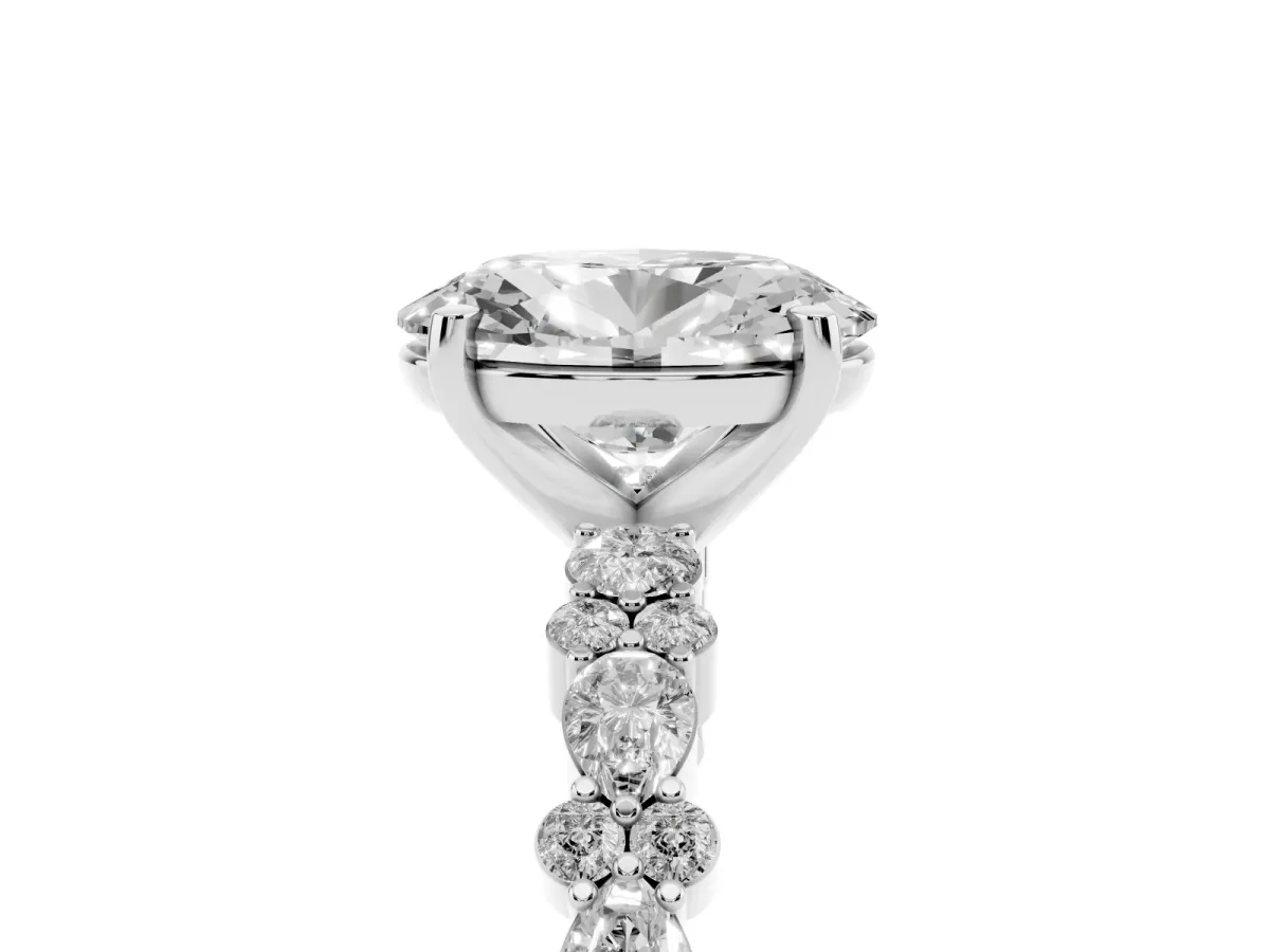Oval Cut Diamond Side Stone Solitaire Ring with Round and Four-Prong Setting Silver