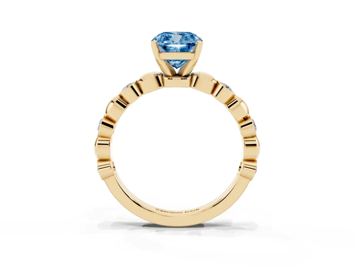 Fancy Blue Cushion Cut Solitaire Bezel-Set Diamond Ring with Beaded Band and Four-Prong Setting Yellow gold