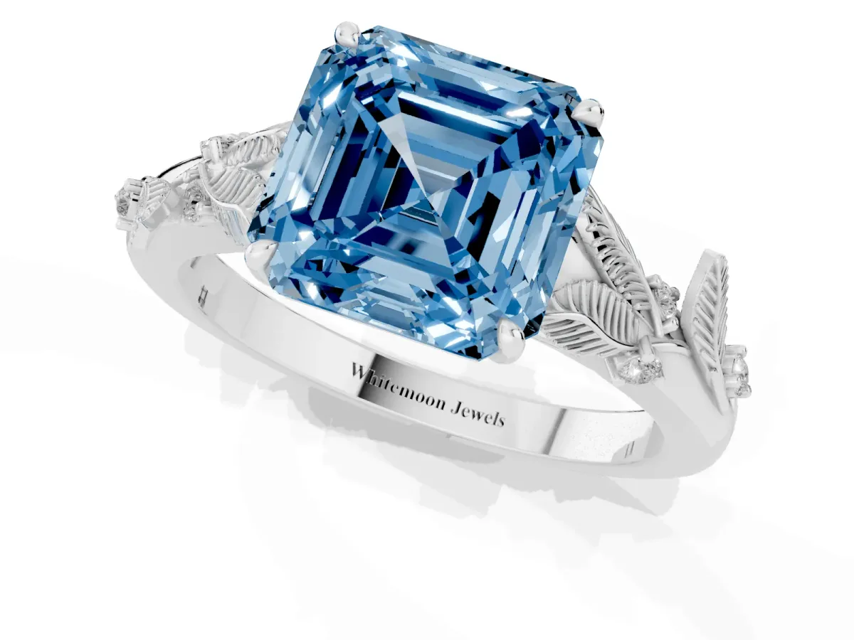 Fancy Blue Asscher Cut Diamond Solitaire Ring with Leaf Motif Band and Four-Prong Setting Silver