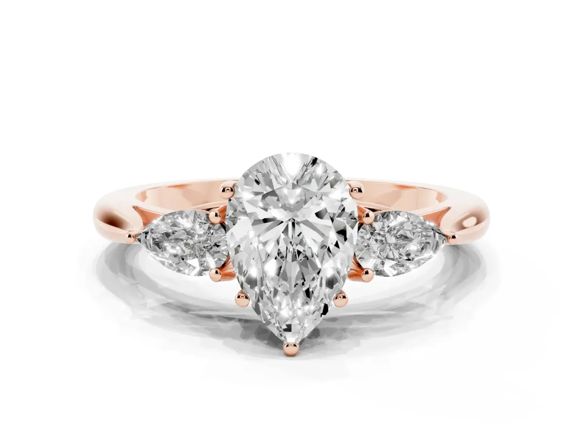 Pear Cut Diamond Three-Stone Ring with Pear Side Stones and Prong Setting Rose gold