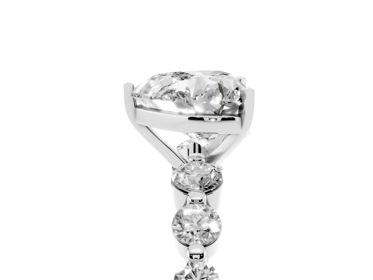 Heart Cut Solitaire Diamond Ring with Pave Band and Four-Prong Setting Silver