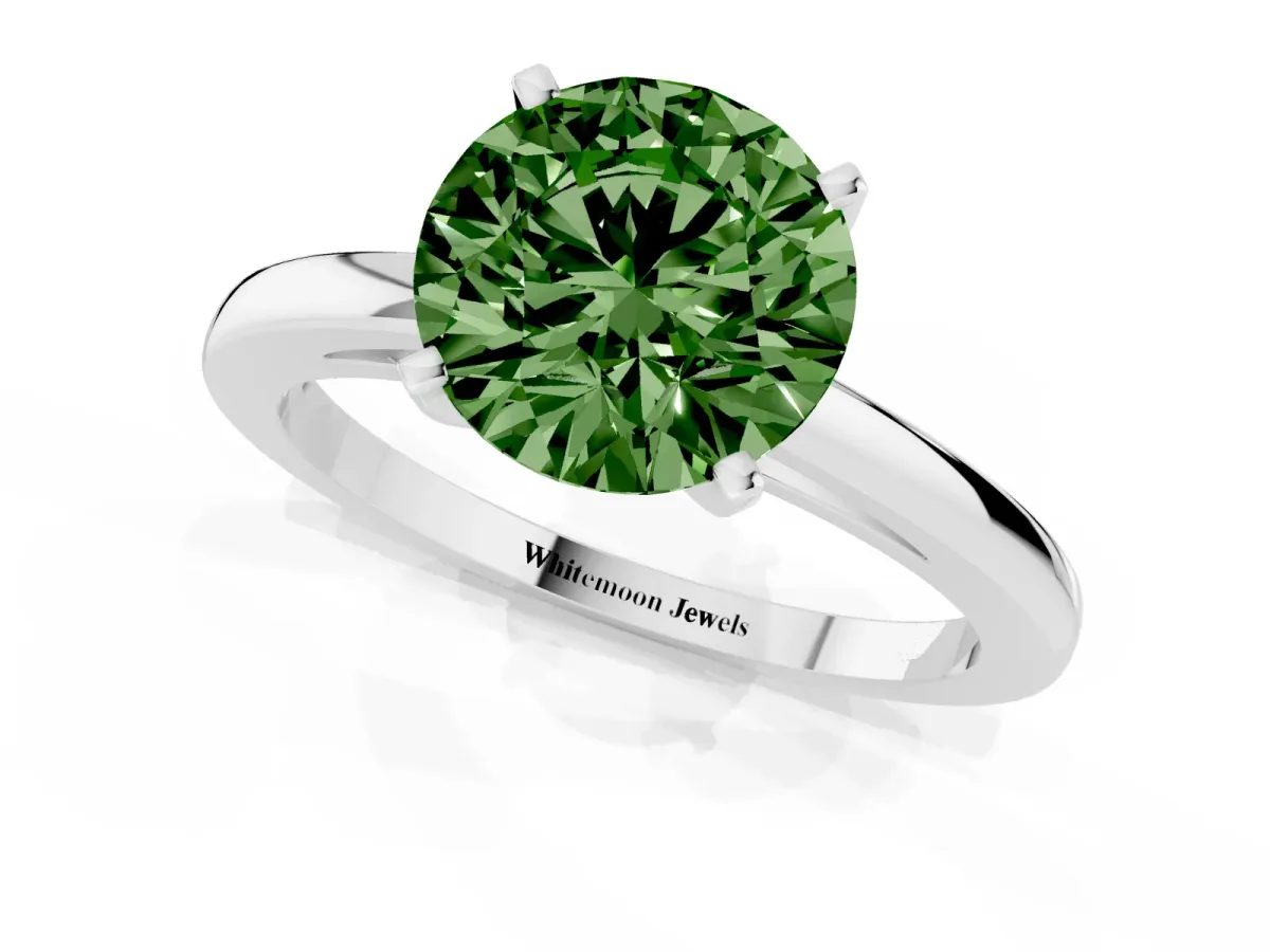 Fancy Green Round Cut Solitaire Diamond Engagement Ring with Four-Prong Setting on a Classic Band Silver