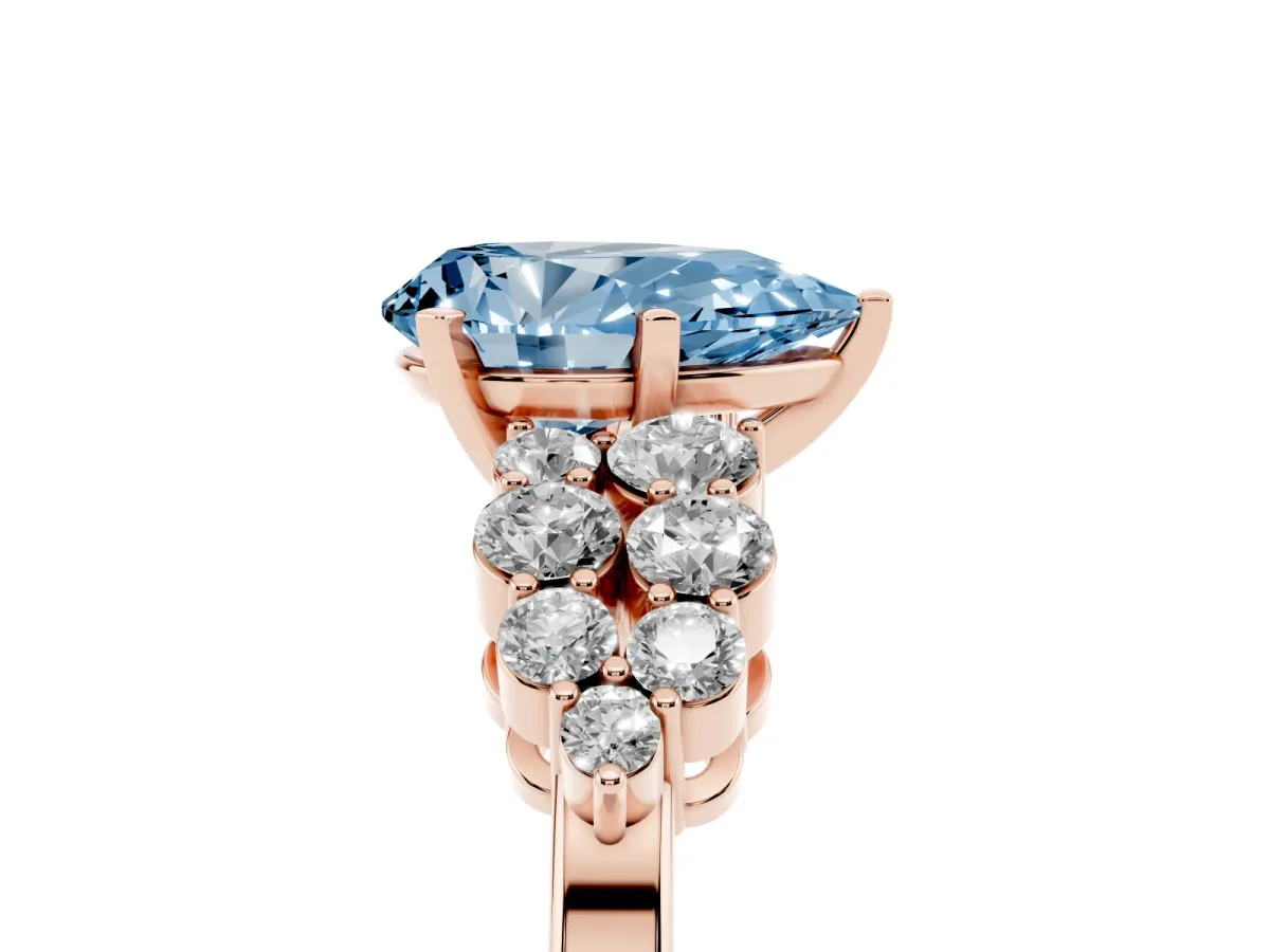 Fancy Blue Pear Cut Cluster Diamond Engagement Ring with Pavé Band and Four-Prong Setting Rose gold