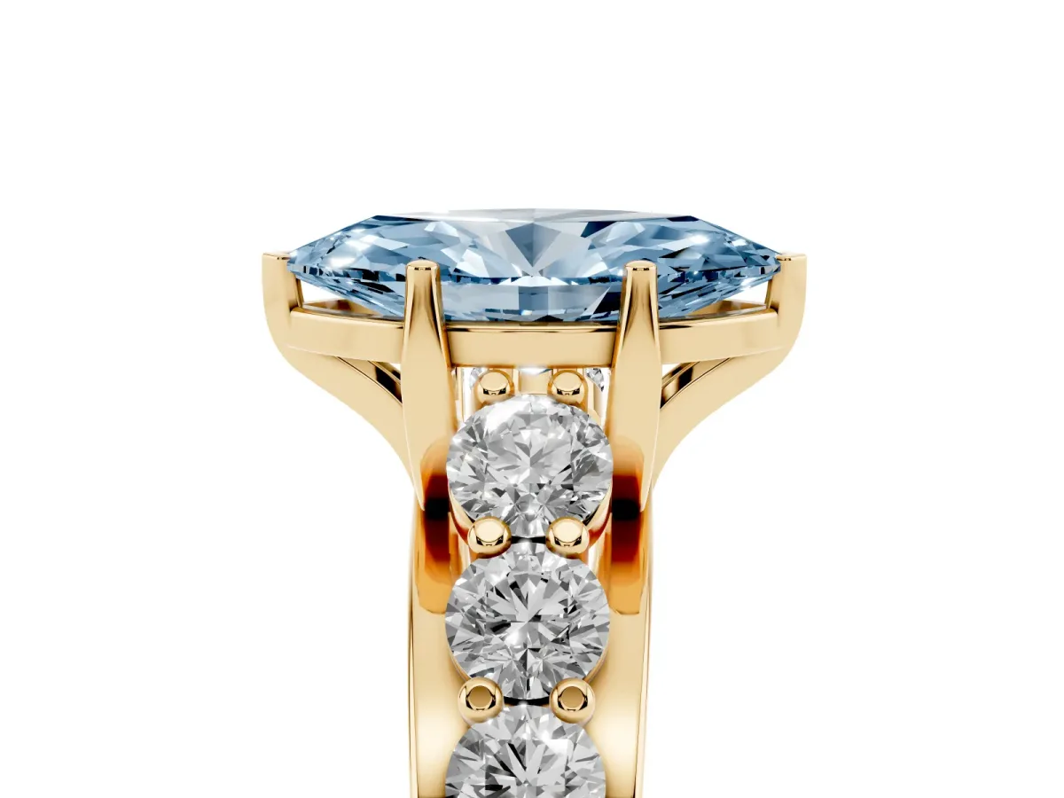 Fancy Blue Marquise Cut Diamond Engagement Ring with Pavé Band and Four-Prong Setting Yellow gold