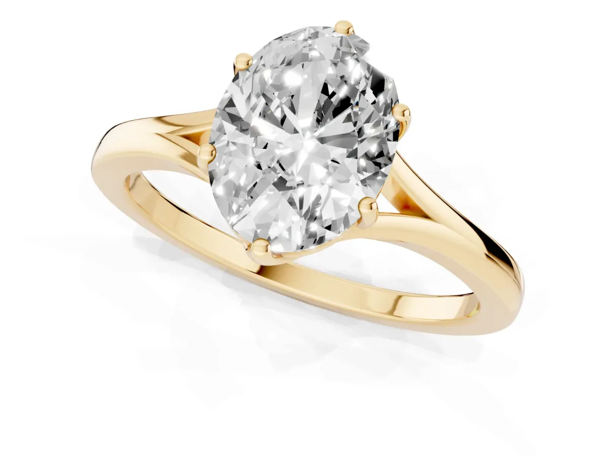 Oval Cut Solitaire Diamond Ring with Six-Prong Setting and Tapered Band Yellow gold