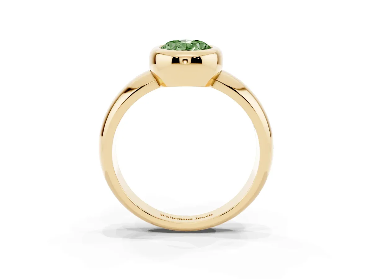 Fancy Green Bezel Set Oval Cut Solitaire Ring with Wide Band Yellow gold