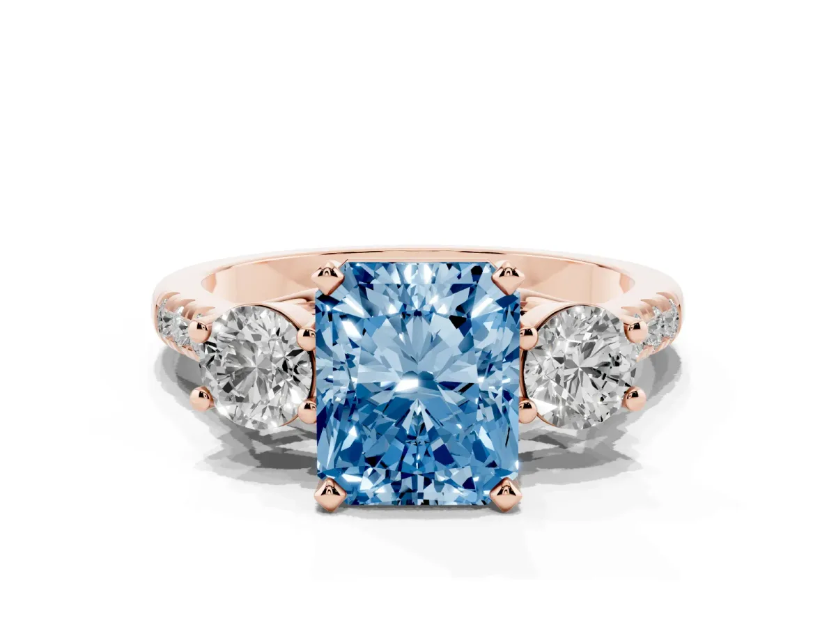 Fancy Blue Three-Stone Radiant Cut Diamond Pavé Band with Four-Prong Setting Rose gold