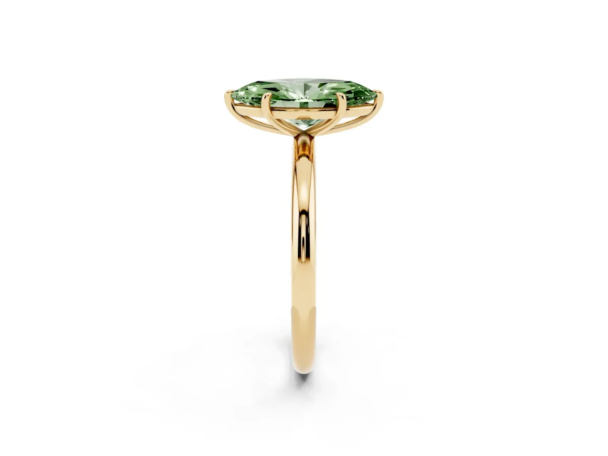 Fancy Green Oval Cut Solitaire Diamond Ring with Four-Prong Setting on a Plain Band Yellow gold
