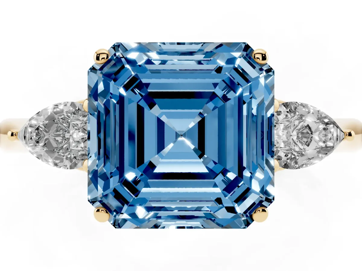 Fancy Blue Asscher Cut Diamond Three-Stone Ring with Pear Side Stones and Prong Setting Yellow gold