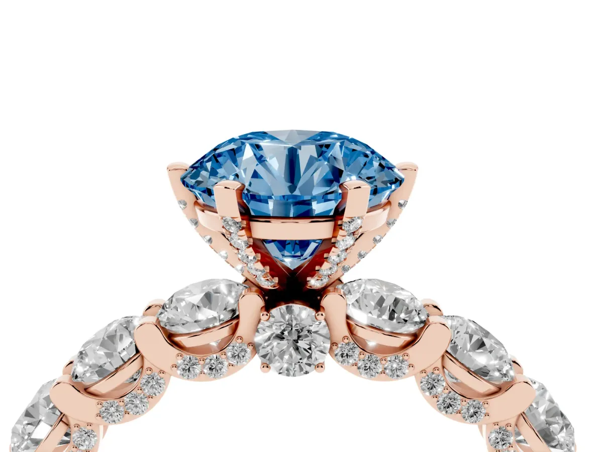 Fancy Blue Round Cut Diamond Side Stone Engagement Ring with Four-Prong Setting Rose gold