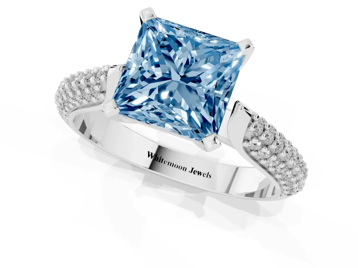 Fancy Blue Princess Cut Diamond Solitaire Engagement Ring with Multi-Row Round Pavé Band and Prong Setting White gold