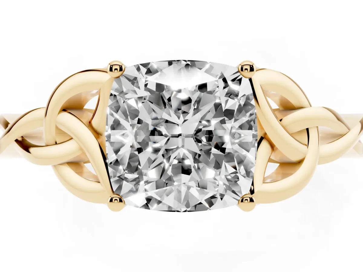 Cushion Cut Diamond Solitaire Engagement Ring with Celtic Knot Band and Four-Prong Setting Yellow gold