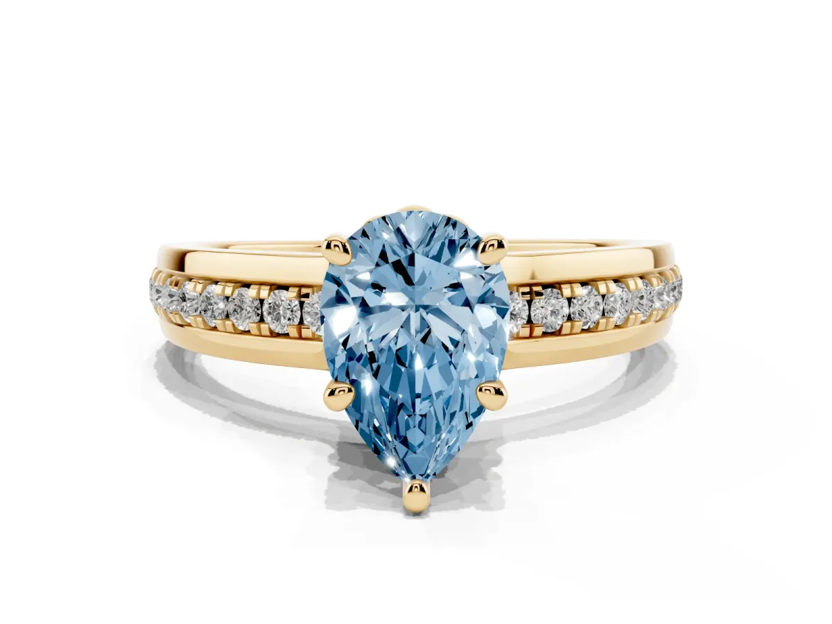 Fancy Blue Pear Cut Solitaire Diamond Ring with Channel Set Band and Six-Prong Setting Yellow gold