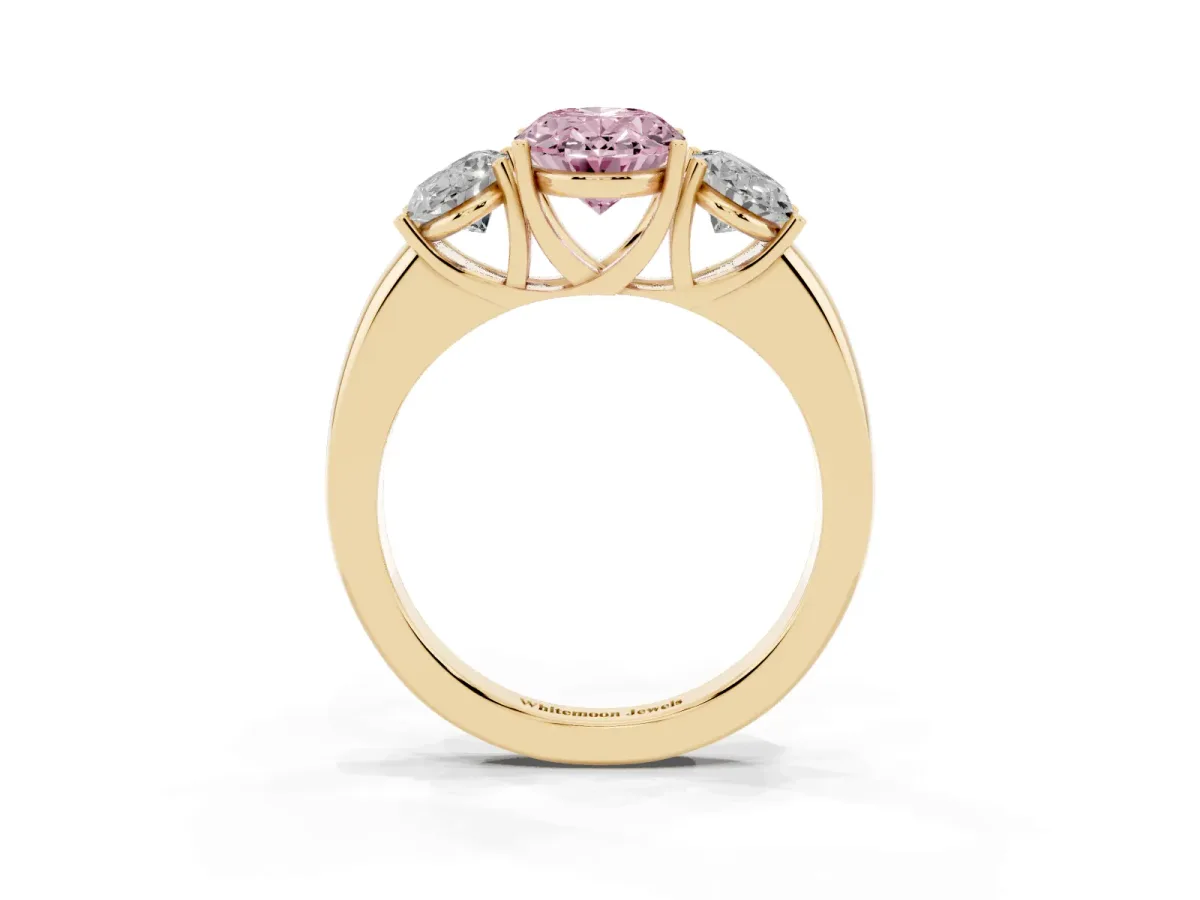 Fancy Pink Oval Cut Diamond Three-Stone Ring with Four-Prong Setting and Classic Band Yellow gold