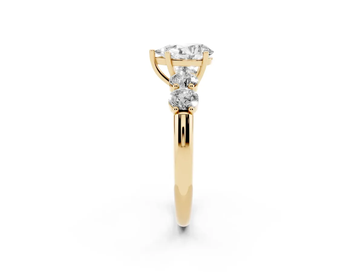 Pear Cut Cut Five-Stone Prong Set Diamond Ring with Classic Band Yellow gold