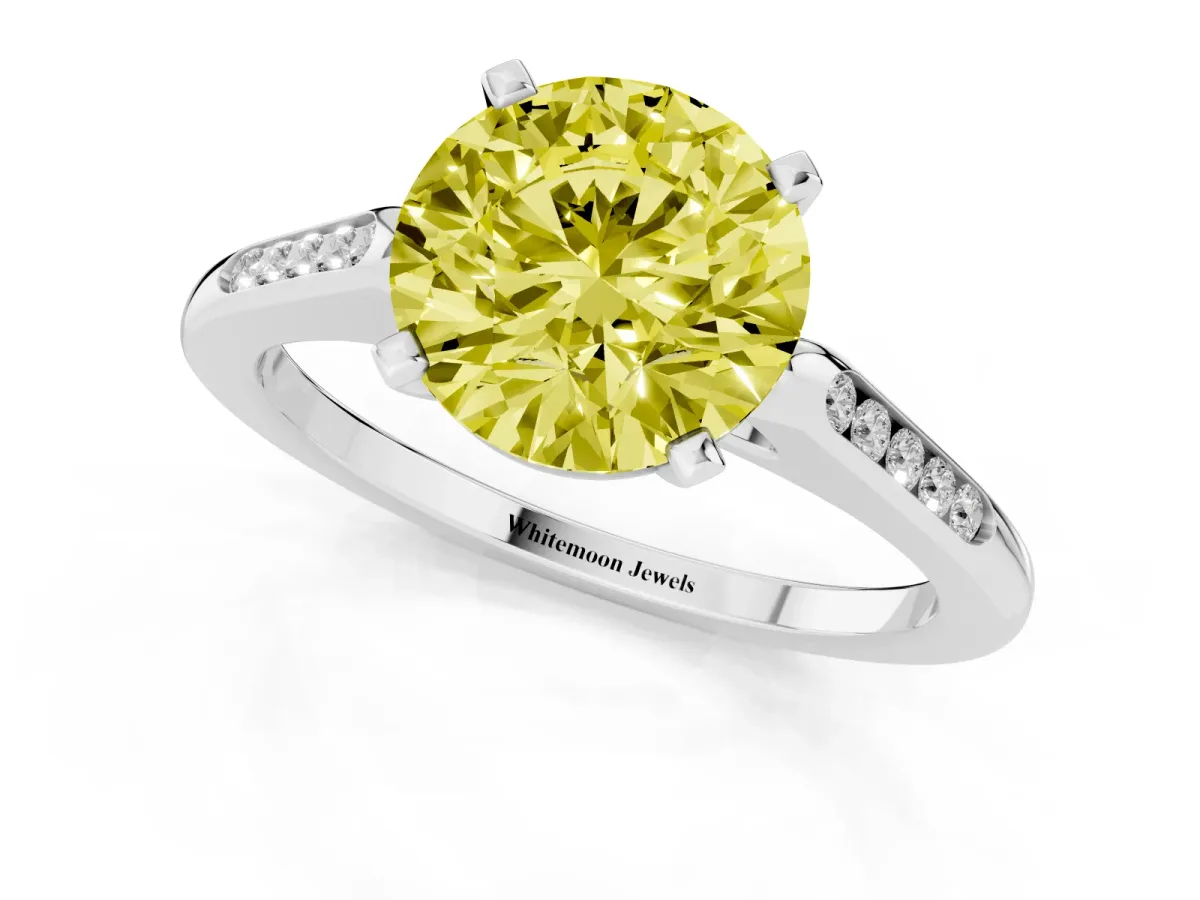 Fancy Yellow Round Cut Diamond Solitaire Ring with Channel Set Round Band and Prong Setting Silver