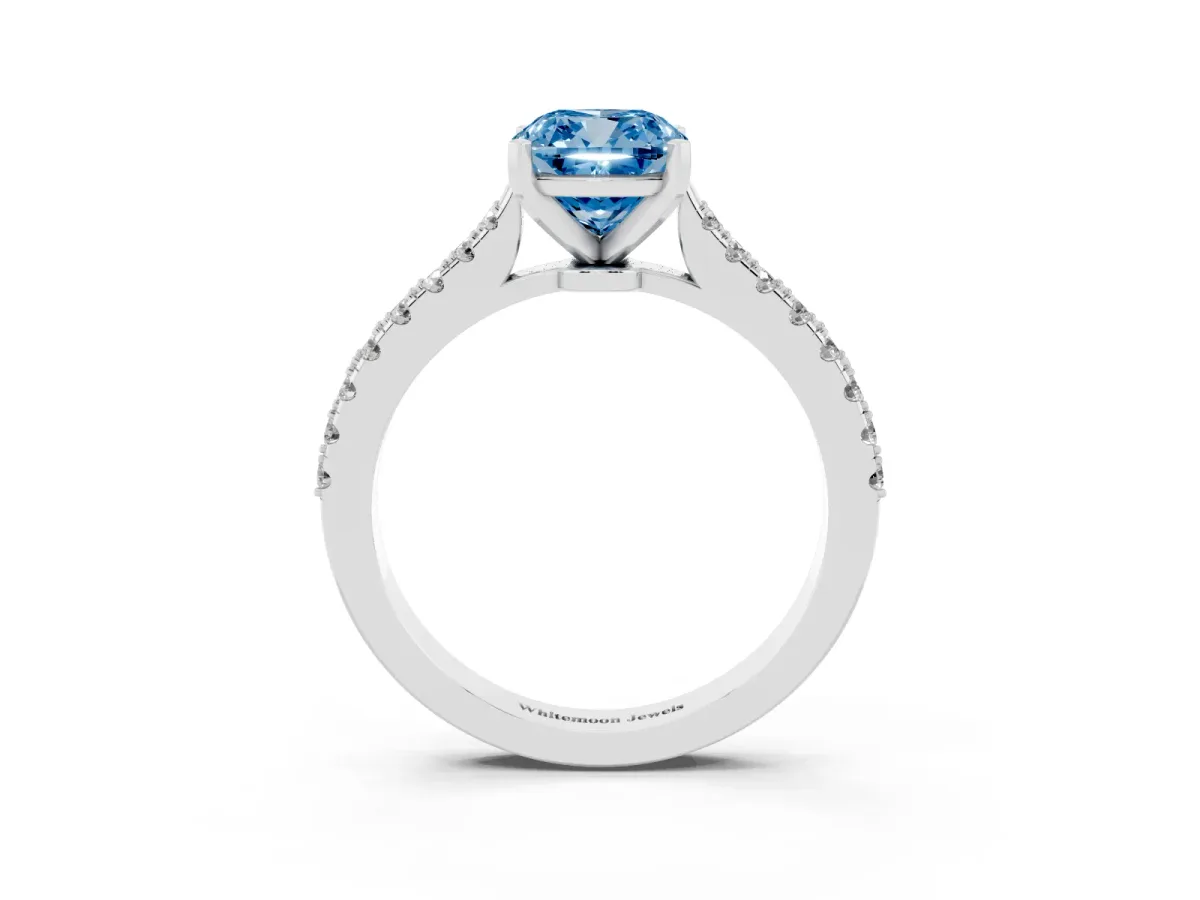 Fancy Blue Cushion Cut Cut Solitaire Diamond Engagement Ring with Pave Band and Four-Prong Setting Platinum