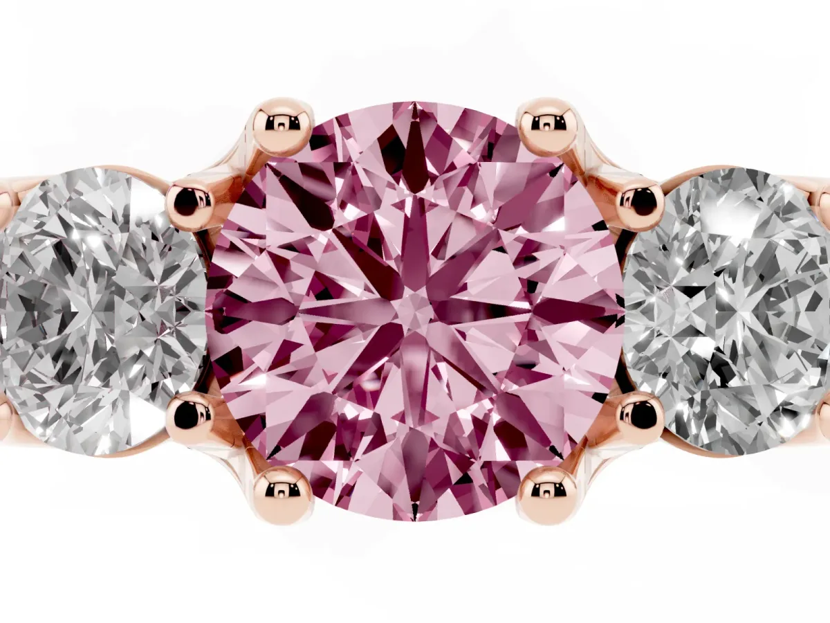 Fancy Pink Round Cut Diamond Three-Stone Ring with Channel Set Band and Four-Prong Setting Rose gold