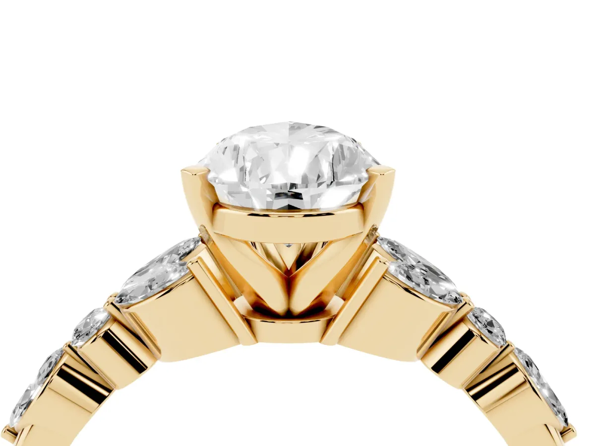 Pear Cut Diamond Solitaire Ring with Side Stones and Four-Prong Setting Yellow gold