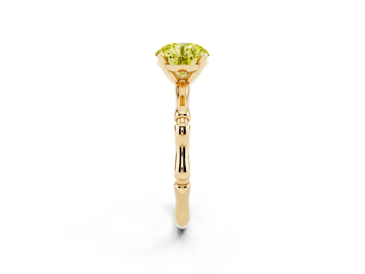 Fancy Yellow Round Cut Solitaire Diamond Ring with Bamboo Band and Four-Prong Setting Yellow gold