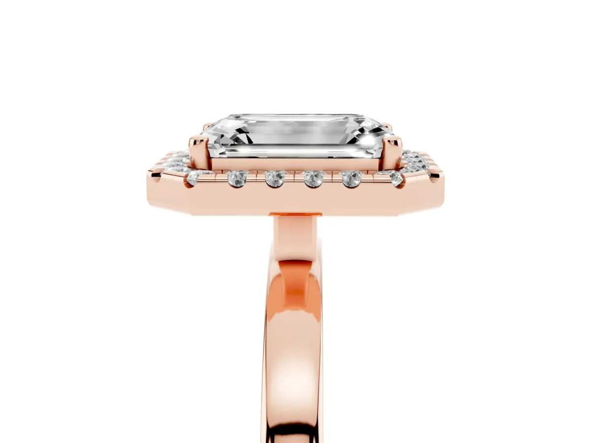 Emerald Cut Halo Diamond Solitaire with Pavé Band and Four-Prong Setting Rose gold