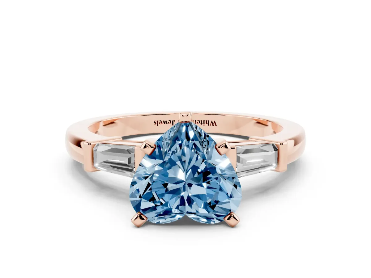 Fancy Blue Heart Cut Cut Diamond Solitaire Ring with Tapered Baguette Accents and Four-Prong Setting Rose gold