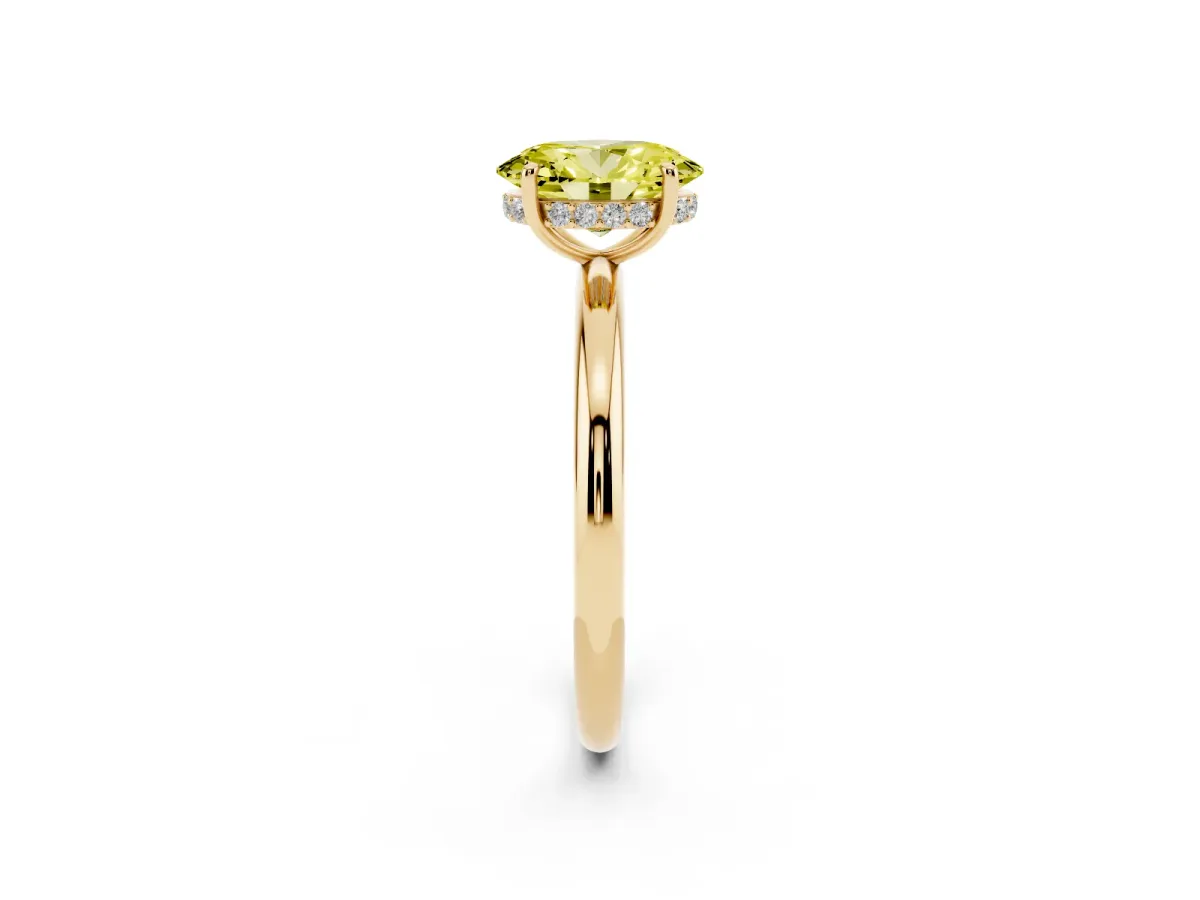 Fancy Yellow Oval Cut Diamond Solitaire Ring with Thin Band and Four-Prong Setting Yellow gold