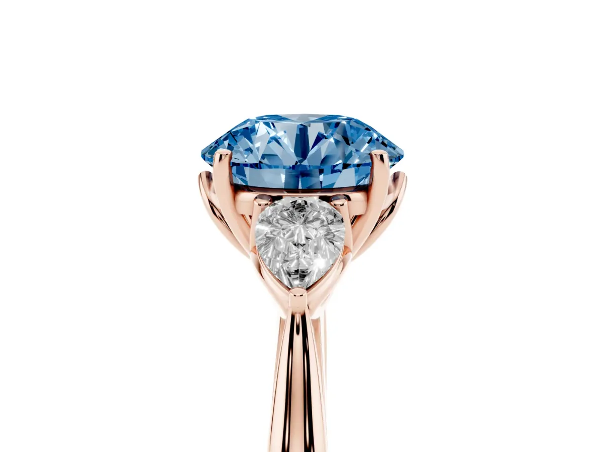 Fancy Blue Three-Stone Round Cut Brilliant Diamond Solitaire Ring with Tapered Band and Four-Prong Setting Rose gold