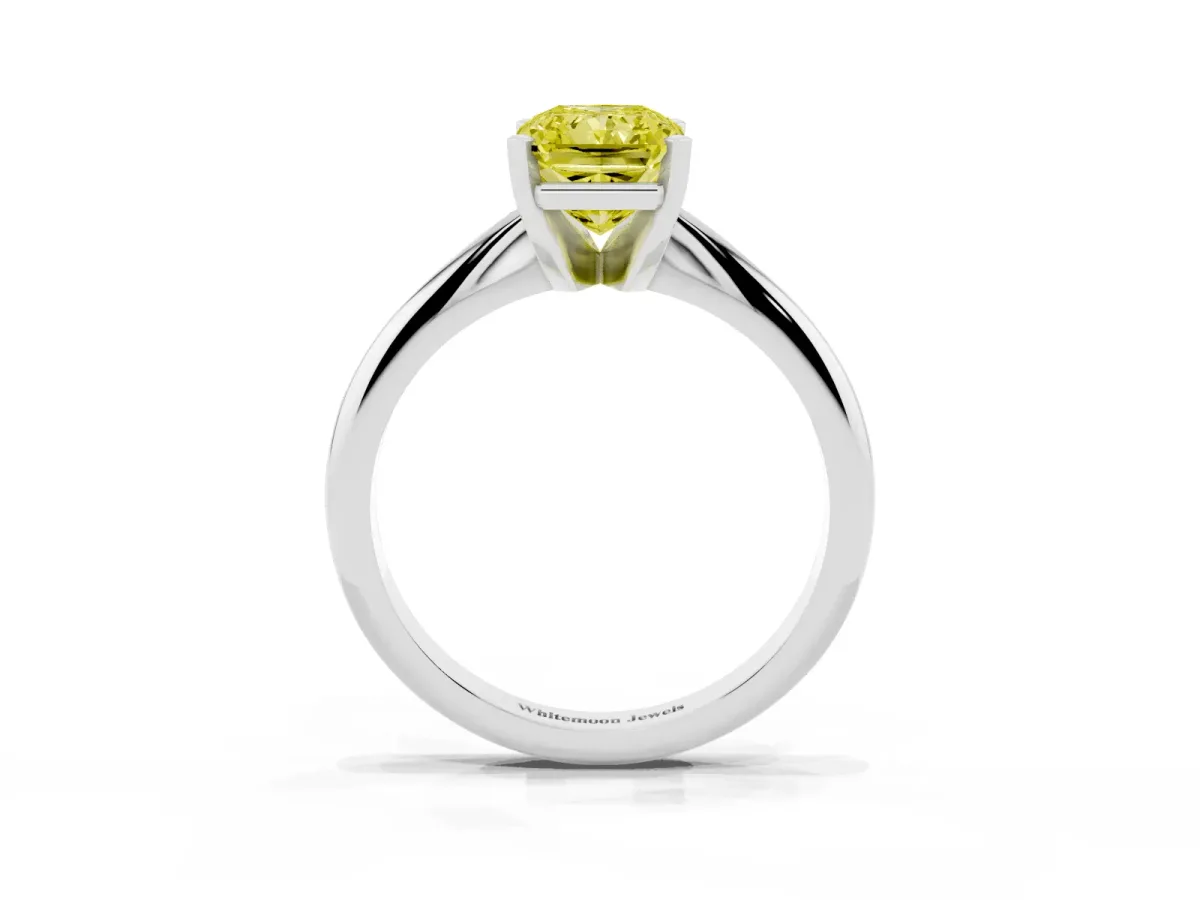 Fancy Yellow Radiant Cut Cut Solitaire Ring with Four-Prong Setting on a Classic Band Silver