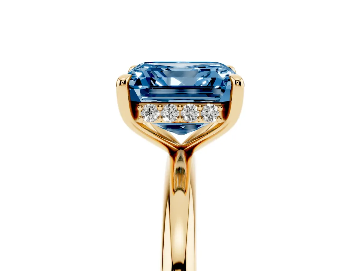 Fancy Blue Asscher Cut Diamond Solitaire Ring with Thin Band and Four-Prong Setting Yellow gold