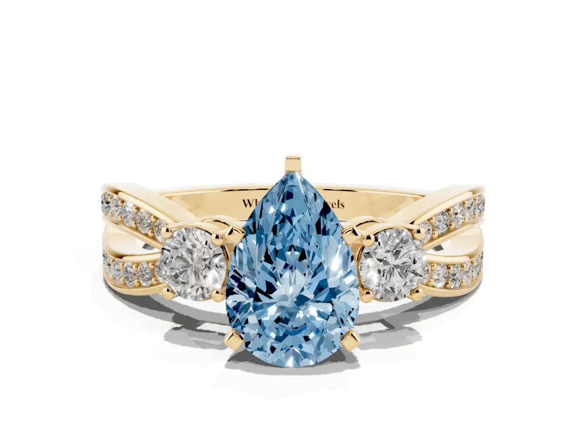 Fancy Blue Three-Stone Pear Cut Cut Diamond Twist Band with Prong Setting Yellow gold