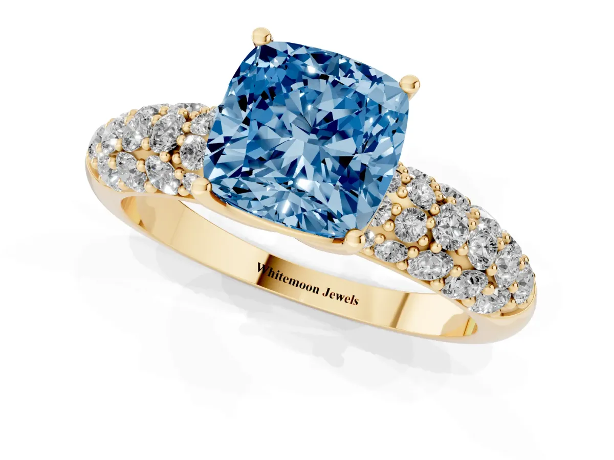 Fancy Blue Cushion Cut Diamond Pavé Band Solitaire Ring with Four-Prong Setting Yellow gold