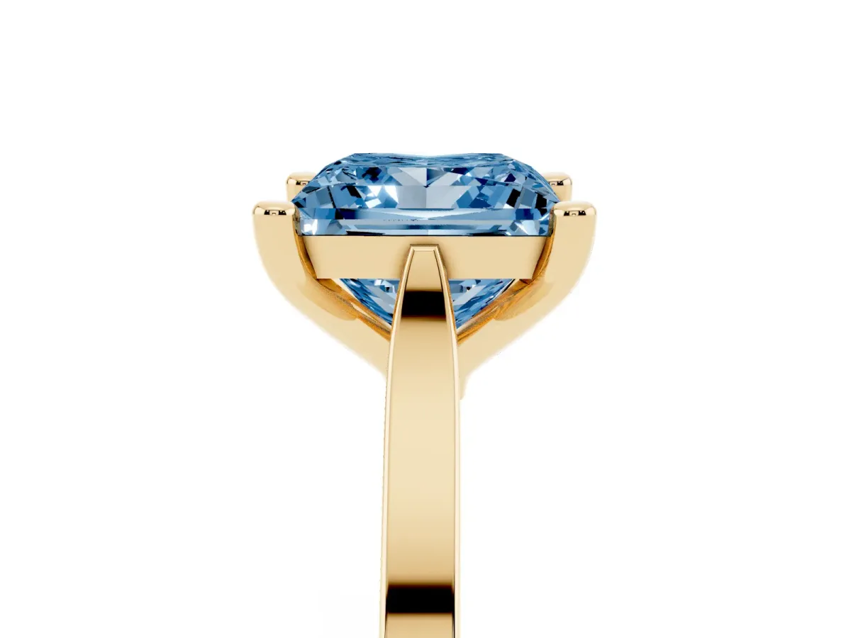 Fancy Blue Princess Cut Solitaire Diamond Ring with Four-Prong Setting and Tapered Band Yellow gold
